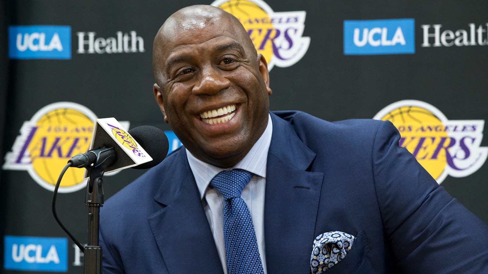 Details on Magic Johnson's share in the Washington Commanders sale.